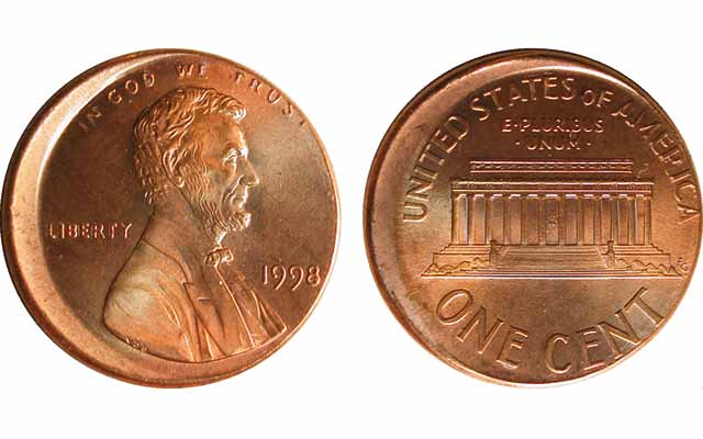 1998 Lincoln penny off-center strike showing blank planchet with design shifted significantly to one side