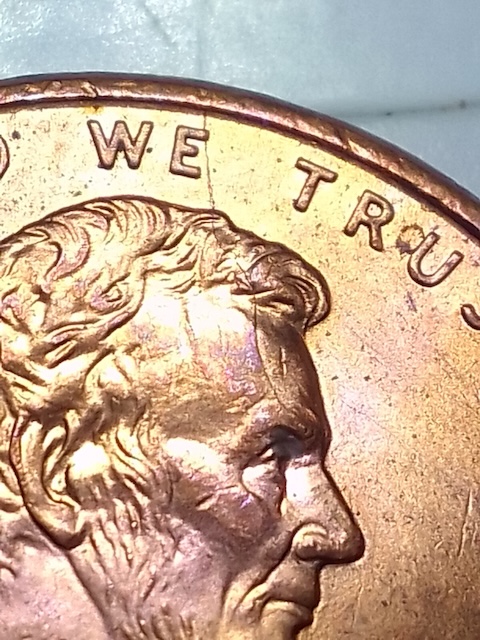 1998 Lincoln penny obverse showing BIE die crack between B and E in LIBERTY making it read LIBIERTY